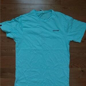 Swannies turquoise golf t-shirt